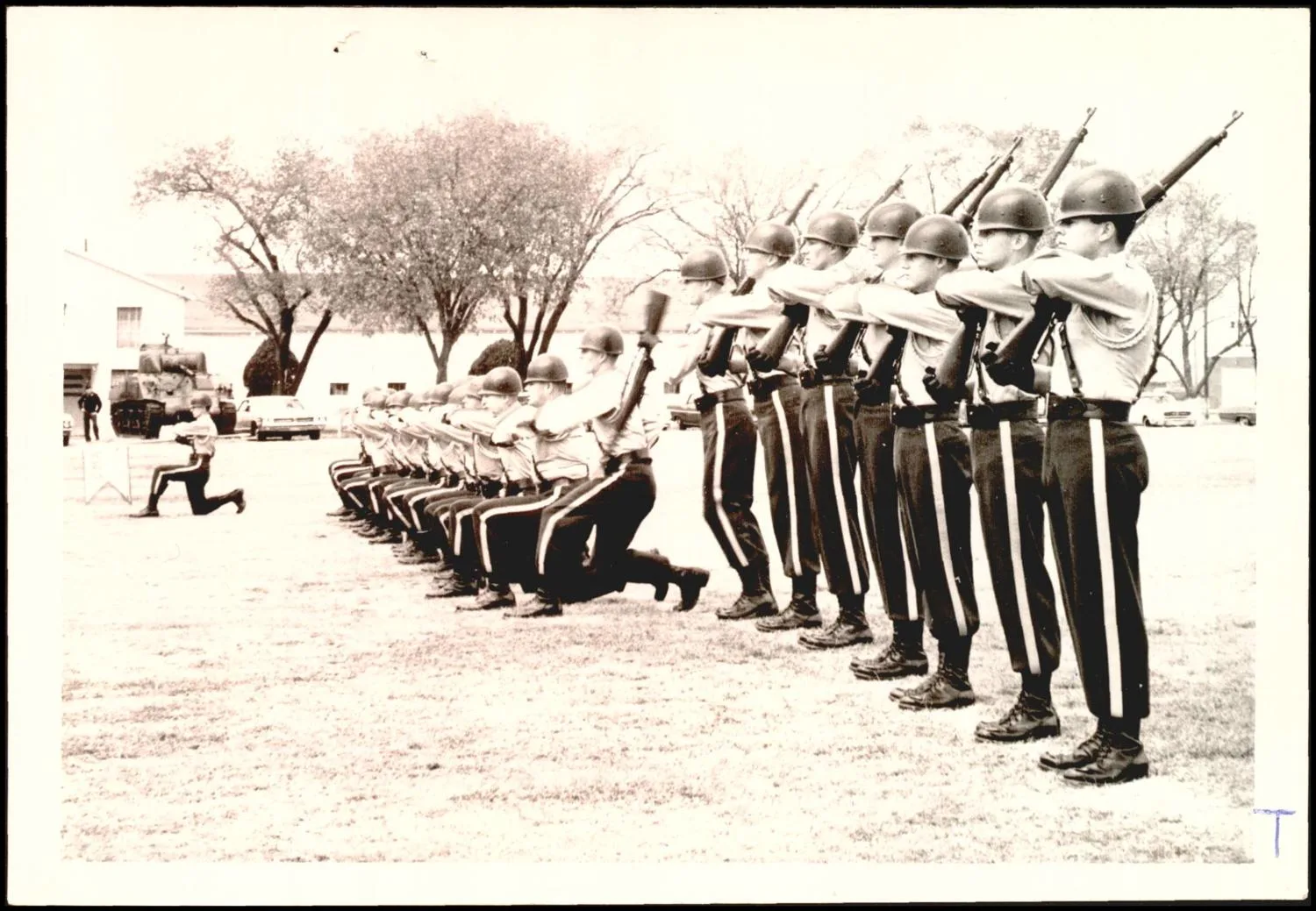 Photograph used for a story in the Daily Oklahoman newspaper. Caption: "Precision performance of the Oklahoma Military Academy drill team."