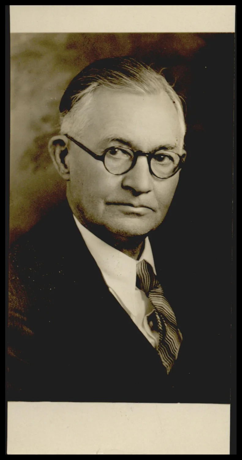 Photograph taken for a newspaper owned by the Oklahoma Publishing Company. Caption: "Attorney for school band commission"
