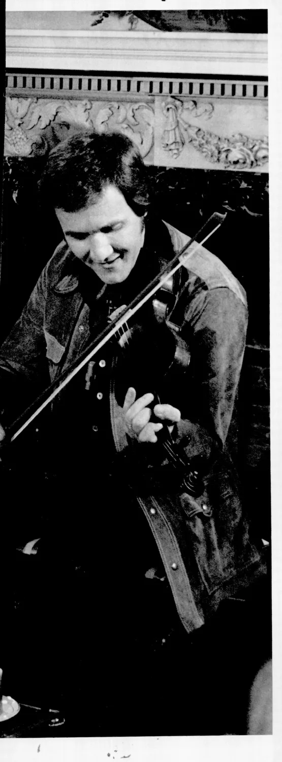 Miller Roger with fiddle.
