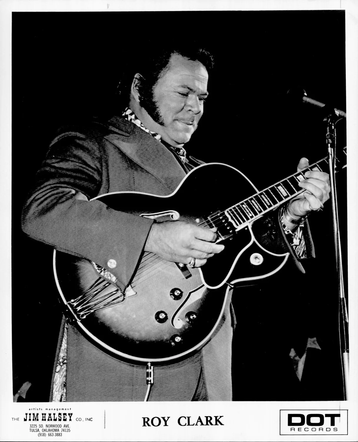 Clark Roy playing guitar.