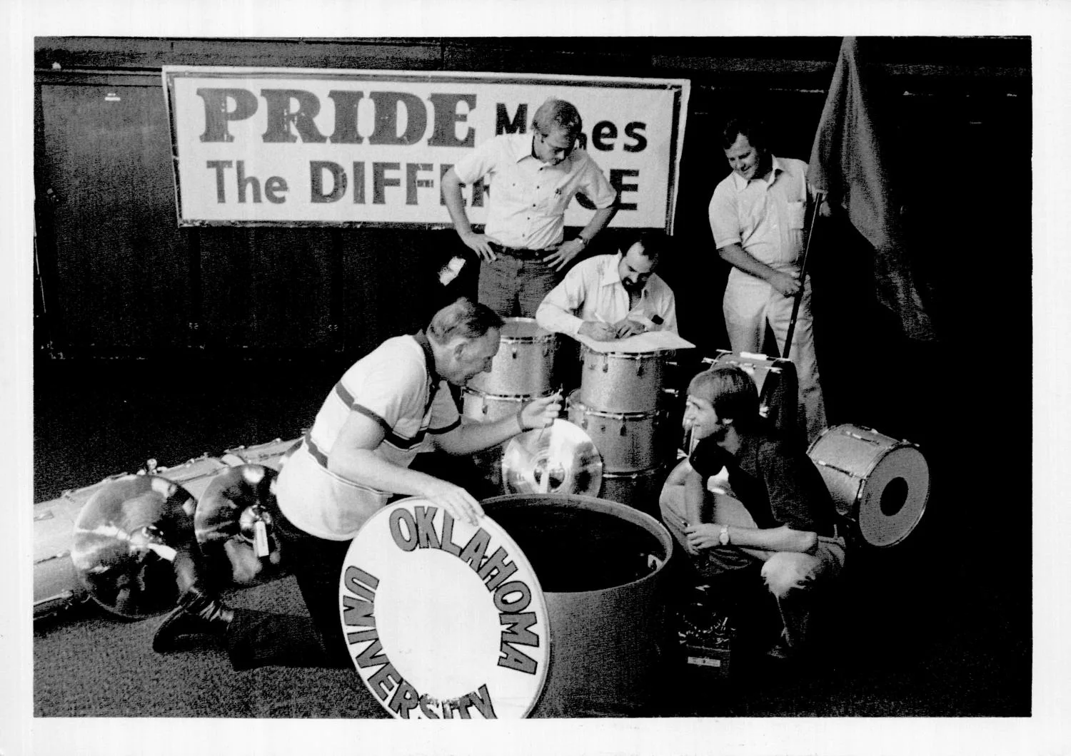 Gene Thrailkill and Bert Gillespie prepare percussion equipment, 1977.