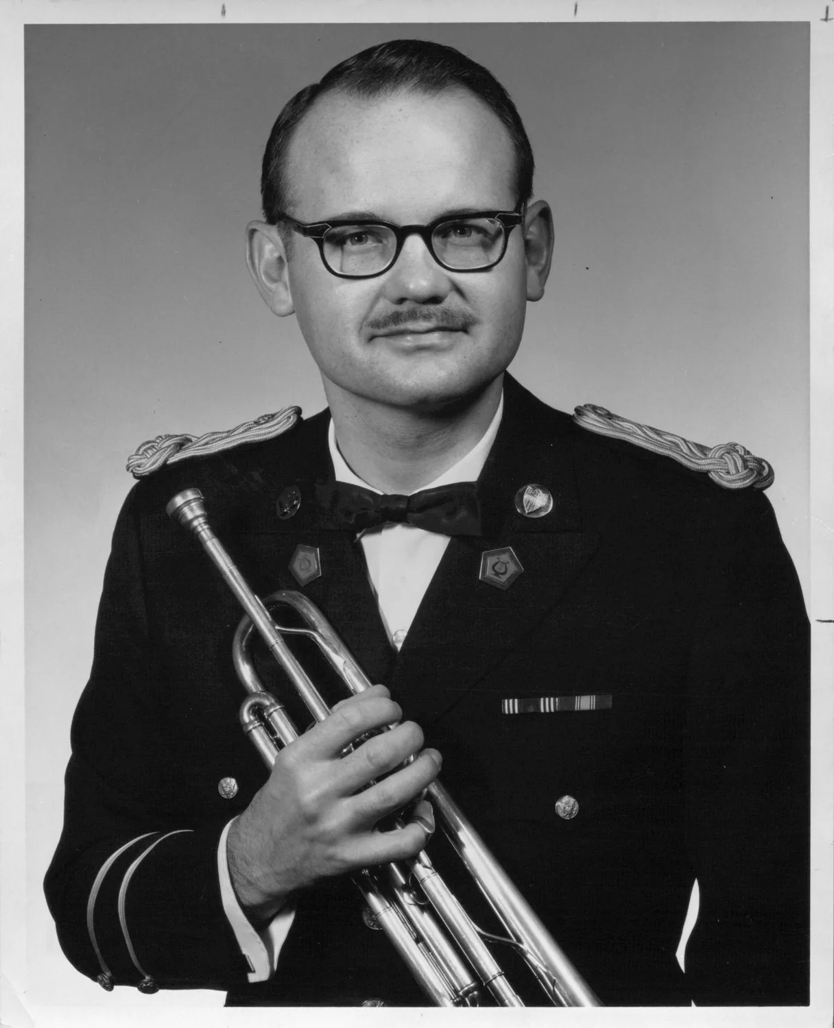 Skinner Spec 6. Larry: Featured trumpet soloist.