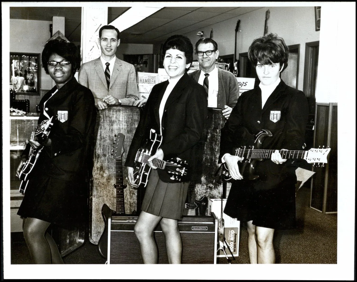 Nancy Smith, Bertha Gascar and Sherry Chambers with guitars at the Guthrie center, 1968.