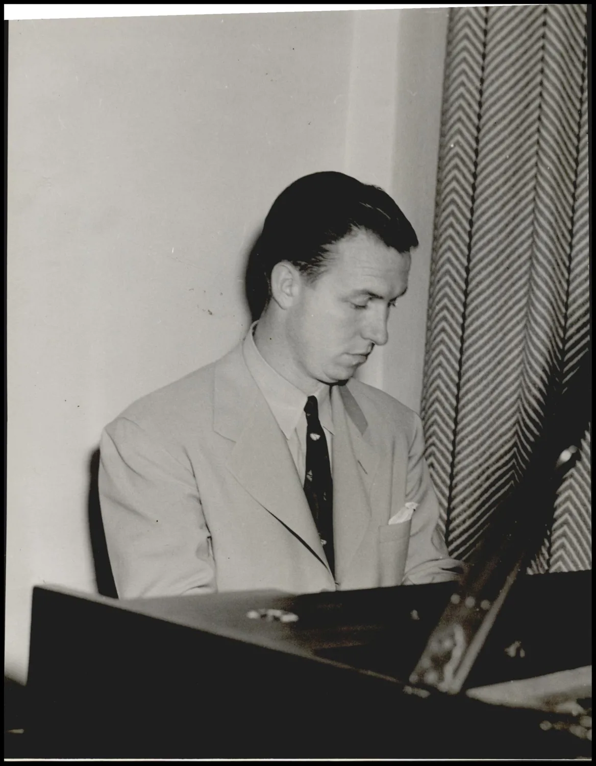 Photograph used for a story in the Daily Oklahoman newspaper. Caption: "Frank Hughes - O. U. Musician"
