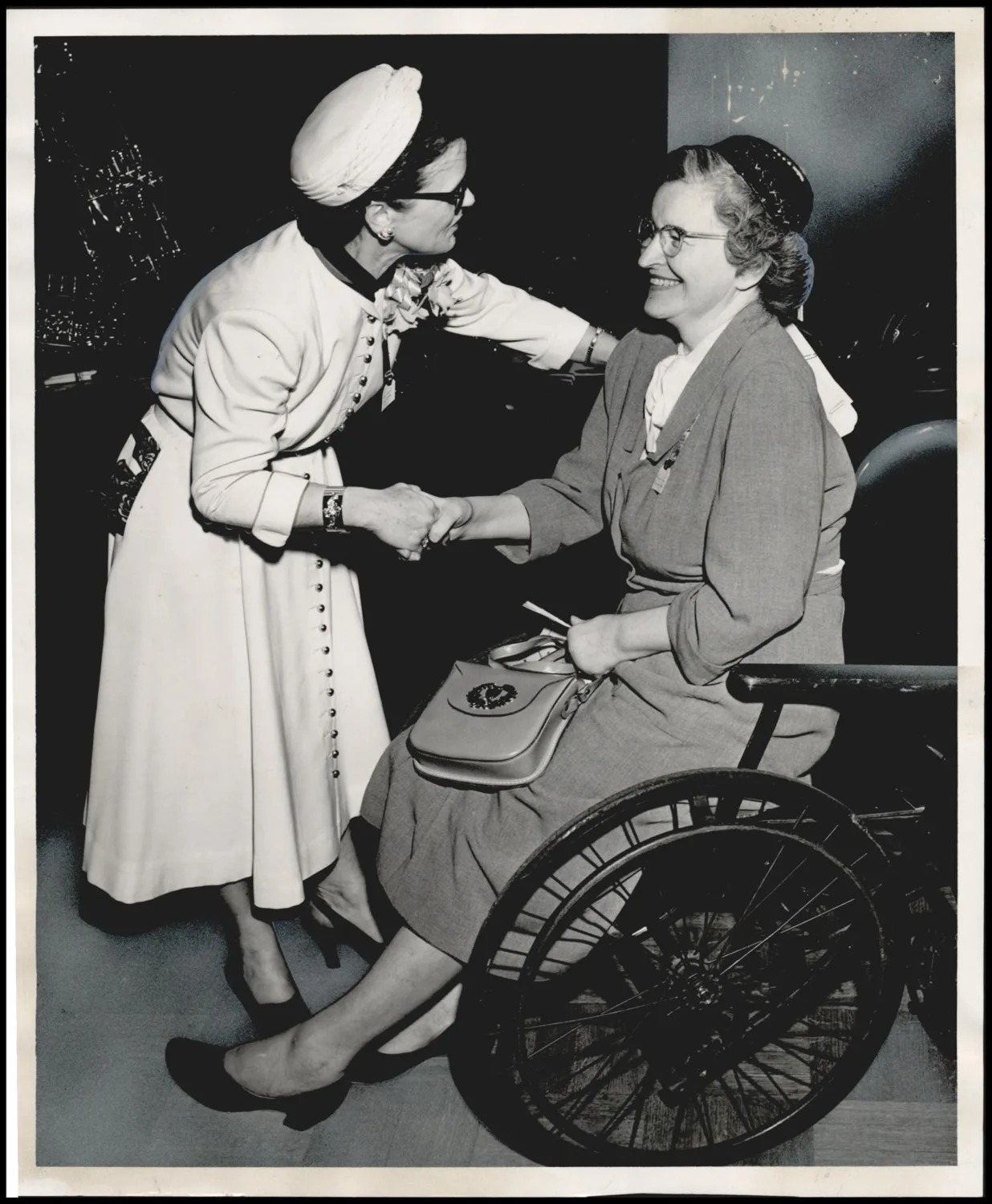 Photograph used for a story in the Oklahoma Times newspaper. Caption: "Mrs. Mildred Moore, of Guymon, has been confined to a wheelchair for 10 years by arthritis, but that hasn't kept her from teaching piano."